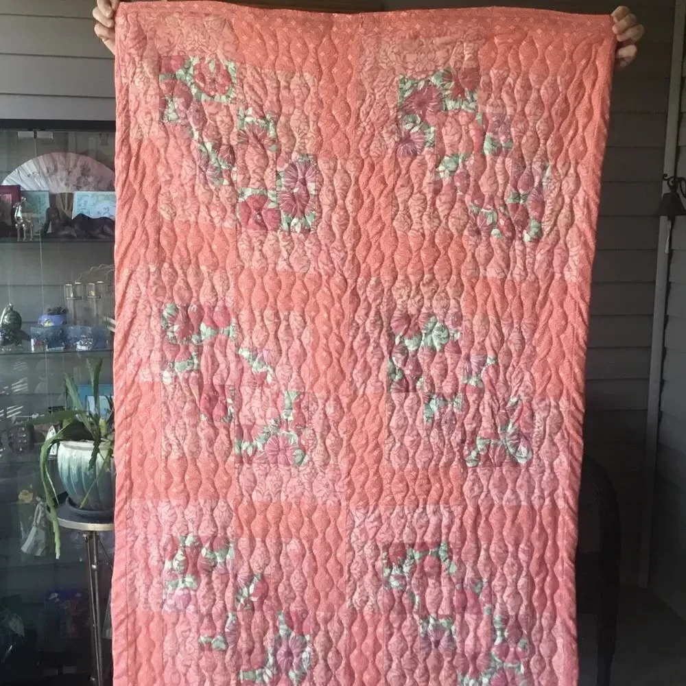 NWT. Hand Crafted Quilt in Corals